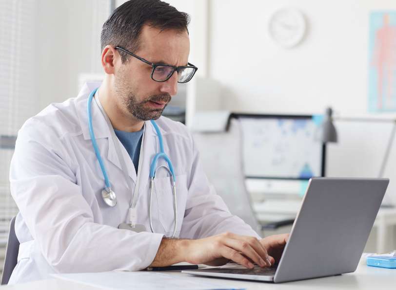 nurse on laptop